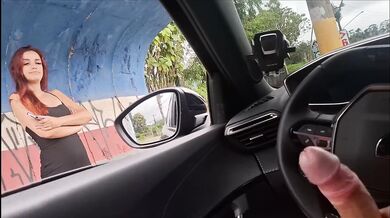 Risky masturbation for a redhead at a public bus stop!
