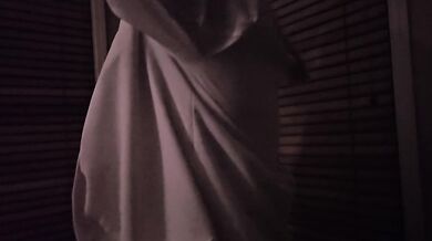 Lady Harland in a white coat