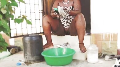 African babe legs apart no panty washing shoes PUSSY SHOWING