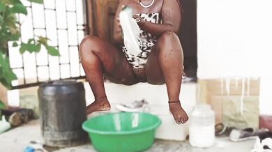 African babe legs apart no panty washing shoes PUSSY SHOWING