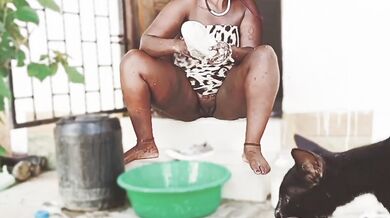 African babe legs apart no panty washing shoes PUSSY SHOWING