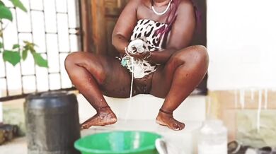 African babe legs apart no panty washing shoes PUSSY SHOWING