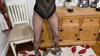 KATHRYN ENGLISH ROSE spins in fishnet leotard