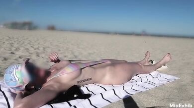 Exposed at the beach in a slutty sling bikini (part 1)