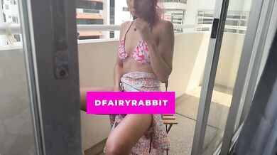 stripping my bikini and using my vibrator on the balcony... i hope they watch