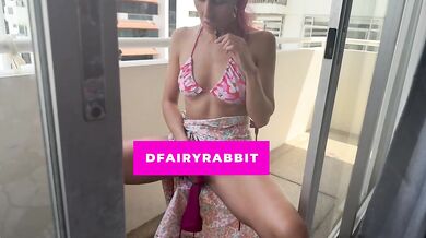 stripping my bikini and using my vibrator on the balcony... i hope they watch
