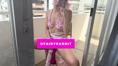 stripping my bikini and using my vibrator on the balcony... i hope they watch