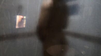 submissive Latina showering in the shower