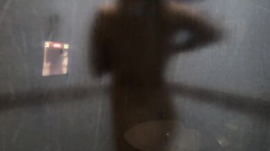 submissive Latina showering in the shower