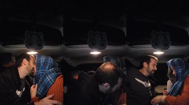 Couple Kissing in the Car