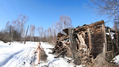 Naked girl in an abandoned village