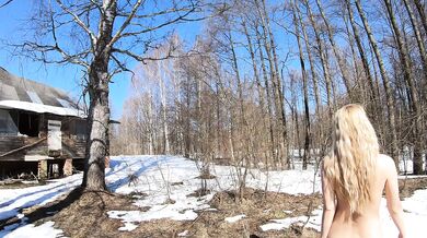 Naked girl in an abandoned village