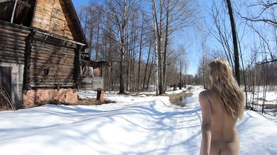 Naked girl in an abandoned village
