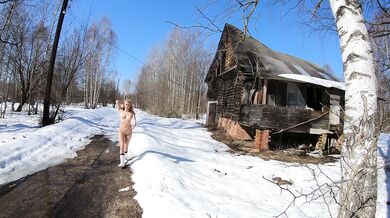 Naked girl in an abandoned village