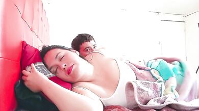 The stepmother resists but warms up and accepts her stepson's hard cock, fucking in a spoon pose.