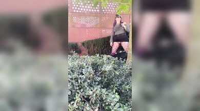 Hot MILF Pees & Cum on edge of busy a public square.
