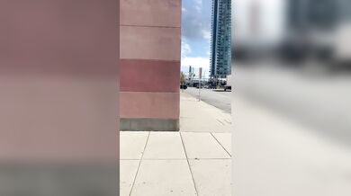 Hot MILF Pees & Cum on edge of busy a public square.