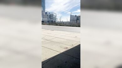 Hot MILF Pees & Cum on edge of busy a public square.