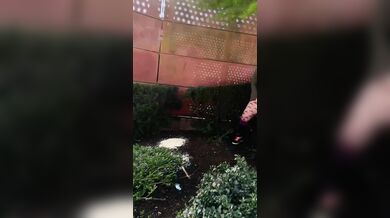 Hot MILF Pees & Cum on edge of busy a public square.