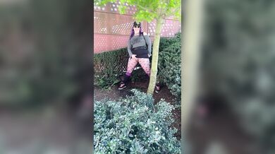 Hot MILF Pees & Cum on edge of busy a public square.
