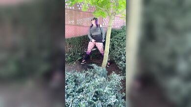 Hot MILF Pees & Cum on edge of busy a public square.