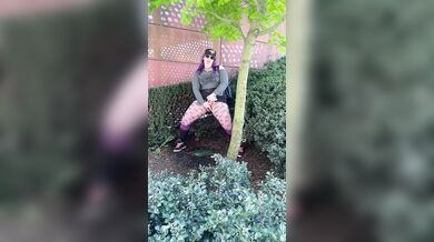 Hot MILF Pees & Cum on edge of busy a public square.