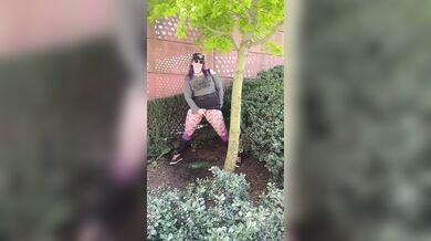 Hot MILF Pees & Cum on edge of busy a public square.