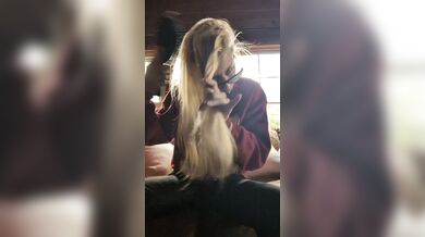 Brushing Hair In Living Space