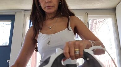 I was doing some ironing when my husband came to get his tshirt and ended up fucking my ass