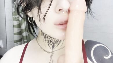 Quick blowjob on a huge dildo