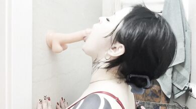 Tattooed girl solo dildo blowjob