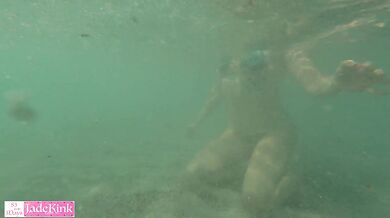 Amateur beautiful girlfriend flashing tits on a public beach