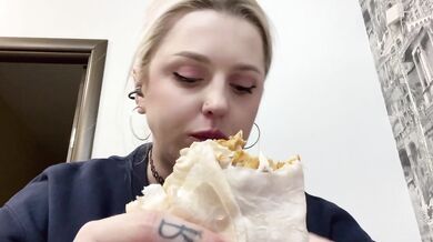 SLAVIC PRETTY BLONDE GOT SO HUNGRY AND STUFFING HERSELF WITH HUGE SHAWERMA TILL HER BELLY IS BURSTING