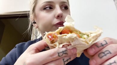 SLAVIC PRETTY BLONDE GOT SO HUNGRY AND STUFFING HERSELF WITH HUGE SHAWERMA TILL HER BELLY IS BURSTING