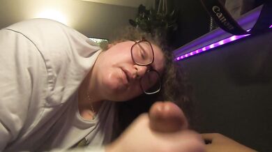 White chubby nerdy girl sucks mixed cock and licks his cum