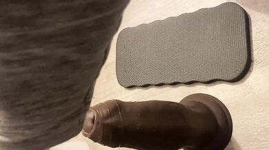 Down on my knees prepping this big ol boy with some lube, the egg deep inside of me, my pussy throbbing because I’ve been stretching myself and now I