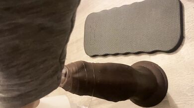 Down on my knees prepping this big ol boy with some lube, the egg deep inside of me, my pussy throbbing because I’ve been stretching myself and now I