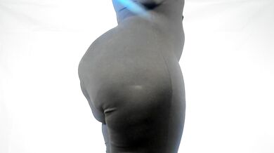 Hour Glass Shaped Big Ass Mistress in tight Jump-suit....