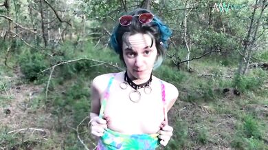 Babe in woods flashes her tits!