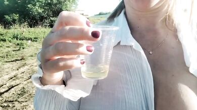 Slut wife toasts with pissing