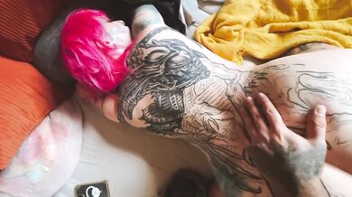 Tattooed Goth Slut takes it from behind and gets her face covered in cum
