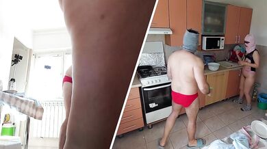 Crazy amateur couple having fun in the kitchen.
