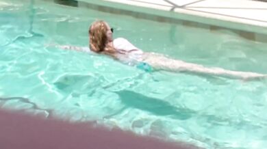 She teased me in the pool before the neighbors ruined a bj