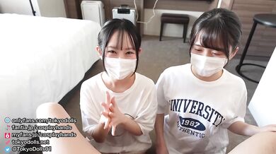 Japanese girls in loungewear gives a guy a handjob while drooling.