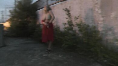 PUBLIC EXTREME! A crazy girl is jerking off in front of a train and pissing on the tracks
