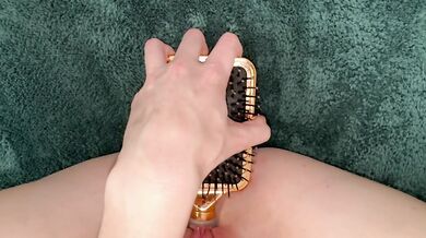I can't get enough of the creamy insertion of my hairbrush into my pussy