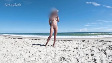 I spent the day showing off my naked body at the beach. Strangers nearby are enjoying the view !