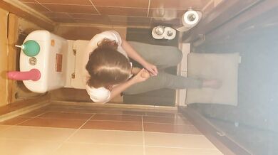 Dominatrix girl in the toilet without mercy fucked strapon her slave man in the ass