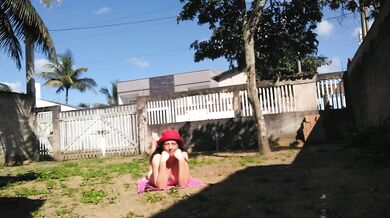 I'm completely naked touching myself in front yard while I take a sunbathing