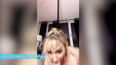 Joanna's pole dances and sucks on a dildo!